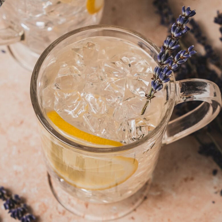 Overhead shot of lemonade in glass with ice.
