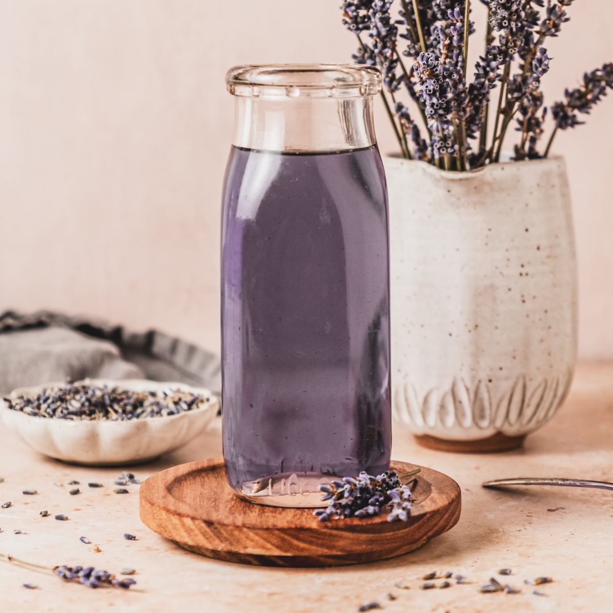 Lavender simple syrup in jar for cocktails and coffee.