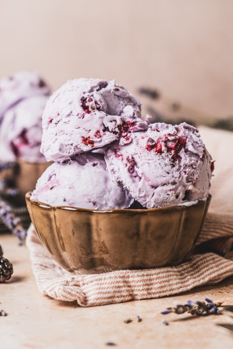 Three scoops of blackberry and lavender ice cream.
